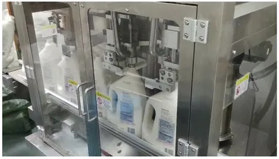 Automatic Integral Liquid Double - Head Cap Filling Machine